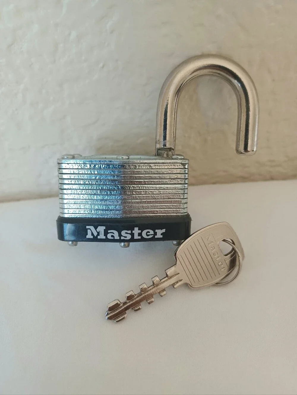 Master Lock Laminated Steel Warded Padlock with Key